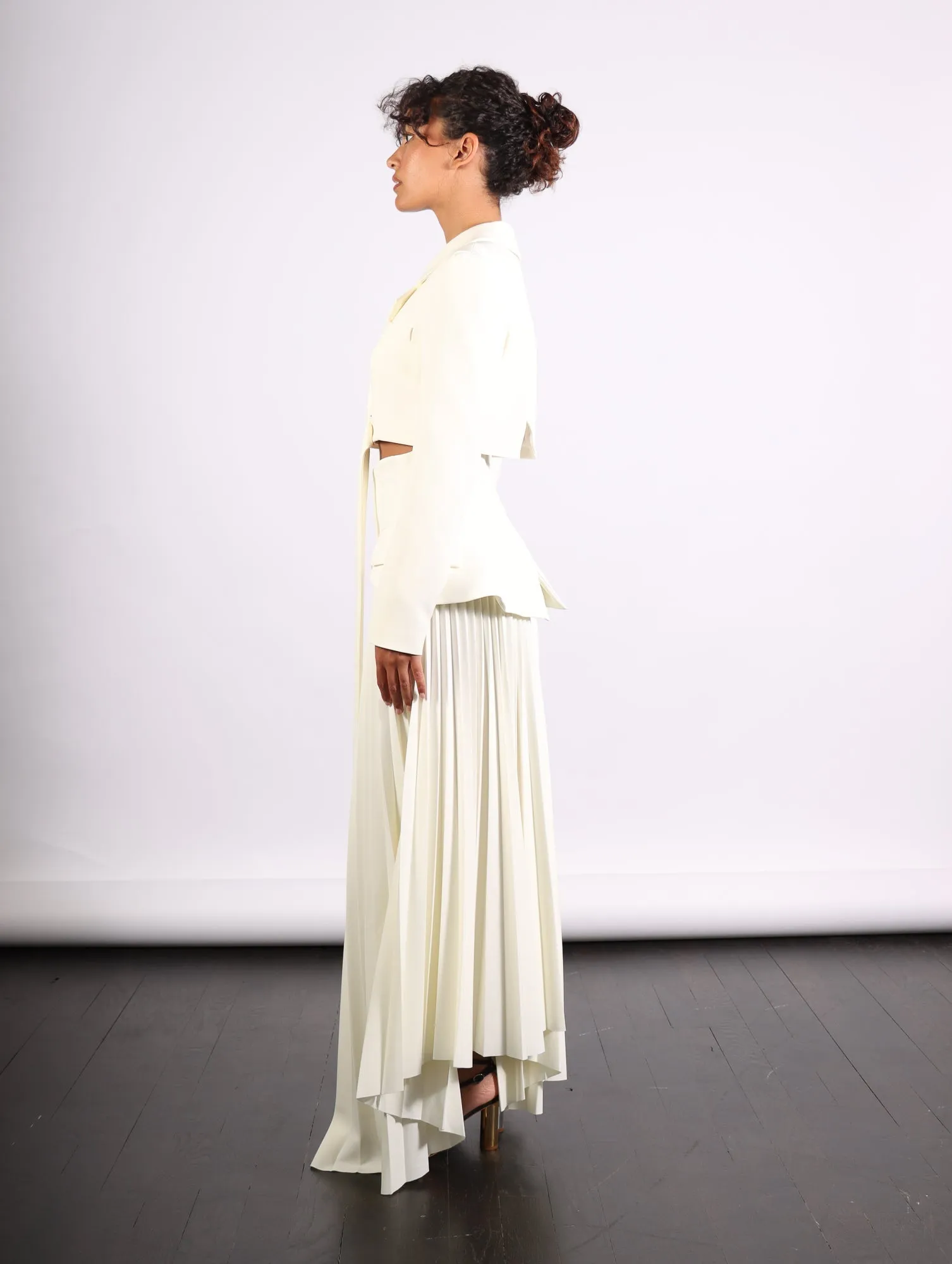 Maxi Pleated Asymmetric Skirt in Ivory by A.W.A.K.E. Mode