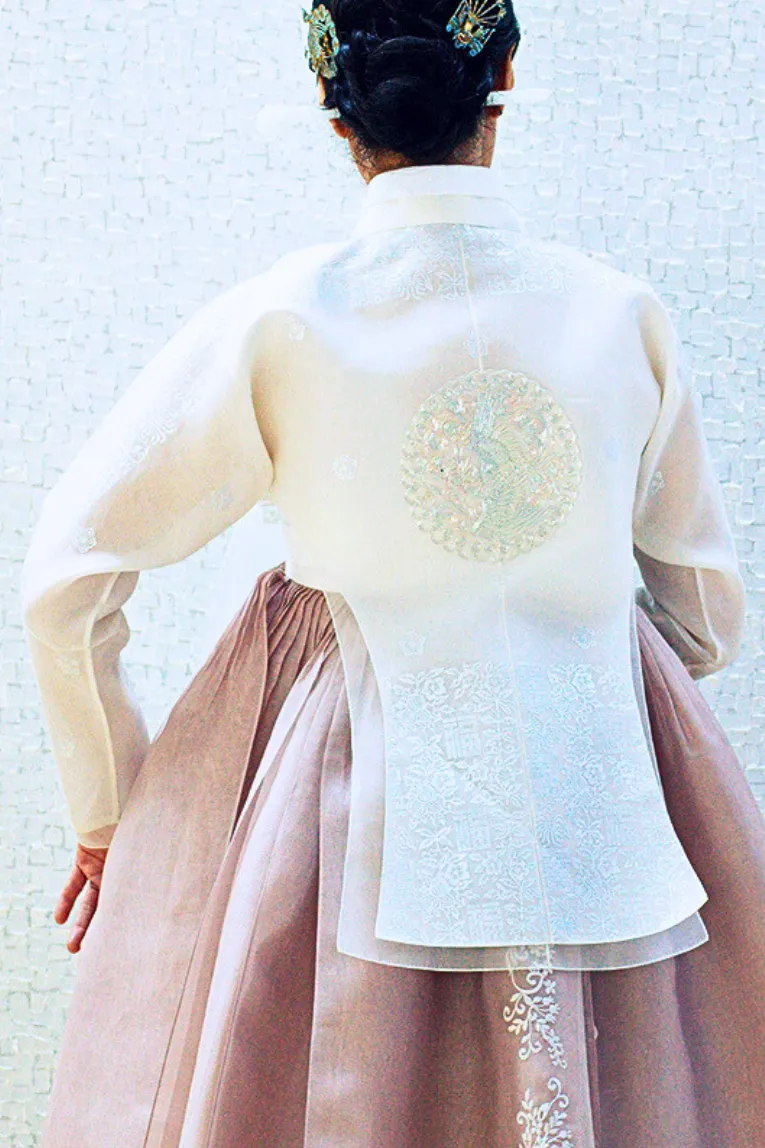 White long sleeved dangui (top) & Double layered panel skirt with embroidery on back